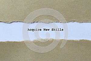 acquire new skills on white paper photo