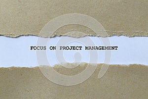 focus on project management on white paper