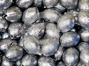 Lead sinkers for fishing rig on the fishing line photo