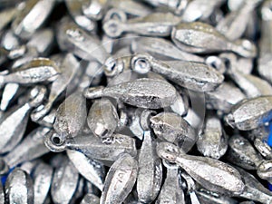 Lead sinkers for fishing rig on the fishing line photo