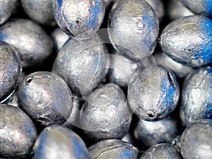 Lead sinkers for fishing rig on the fishing line photo
