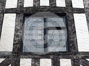 Leaded glass window in a half timbered house