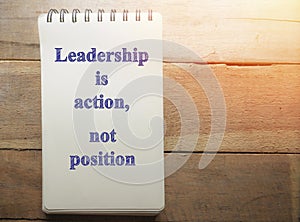 Leadership is action not position, text words typography written on paper, life and business motivational inspirational