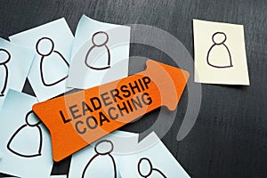 Leadership coaching concept. Stickers with figures and arrow.