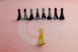 Leadership concept Chess pawn stands out from the crowd. Selective focus