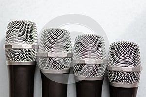 Leadership concept. group of microphones with golden one. freedom to speak up concept