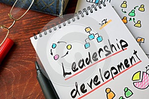 Leadership Development written on a paper. photo