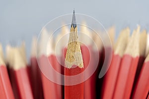 Leadership successful team leader, Red pencil that represents leadership