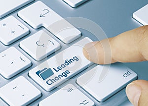 Leading Change - Inscription on Blue Keyboard Key