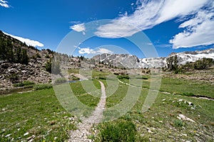 Leading lines of dirt hiking trails to Helen Lake of the 20 Lakes Basin backpacking area of California Sierra Nevada Mountains