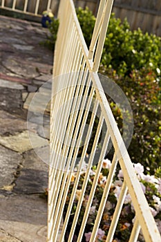 Leading lines of the handrail on a front porch