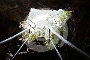 Leading out of a cave