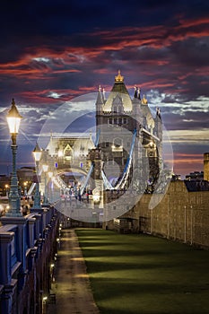 Leading view to the iconic Tower Bridge in London during dusk