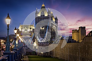 Leading view to the iconic Tower Bridge in London during night time