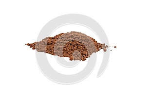 Leaf shaped cocoa powder pile, close up isolated on white background