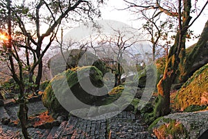 Leafy forest with colossal rock formations in Sanctuary of Penha in Guimaraes