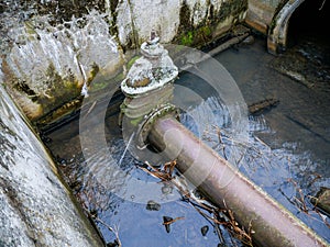 Leaking industrial pipe transporting the sewage water