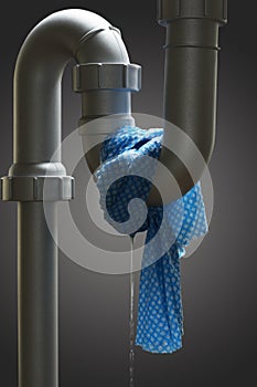 Leaking pipe with towel