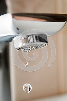 Leaking tap and water drops