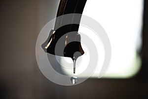 Leaky sink drip photo