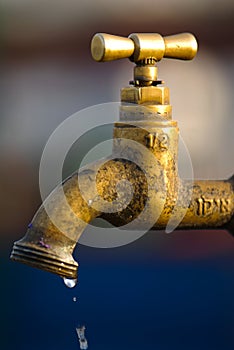 A leaky tap wasting water