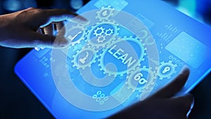 Lean, Six sigma, quality control and manufacturing process management concept on virtual screen.