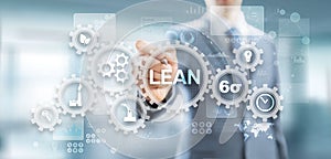 Lean, Six sigma, quality control and manufacturing process management concept on virtual screen.