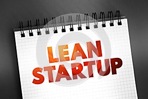 Lean Startup - method used to found a new company or introduce a new product on behalf of an existing company, text on notepad,