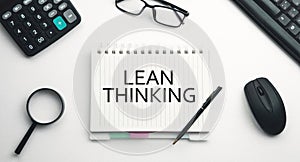 Lean Thinking on notepad. Business concept