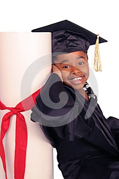 Leaning on her diploma