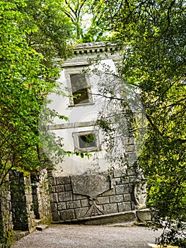 Leaning house in the mysterious Sacred Grove, Bomarzo Gardens, province of Viterbo, Lazio, Italy