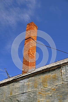 Leaning old chimney