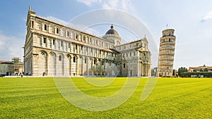 Leaning tower and Pisa cathedral in a summer day in Pisa, Italy