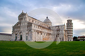 The Leaning Tower of Pisa in Italy and the Miracle Square with the Cathedral. Tourist attraction and monument in Tuscany.