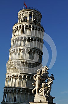 Leaning tower with statue