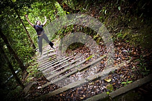 Leaping Woman Jungle Hiker