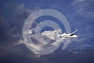 Learjet 45 with Blue Sky & Storm Clouds