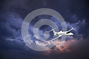 Learjet 45 with Storm Clouds