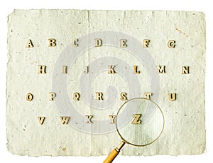 Learn the alphabet wooden letters on home made paper isolated