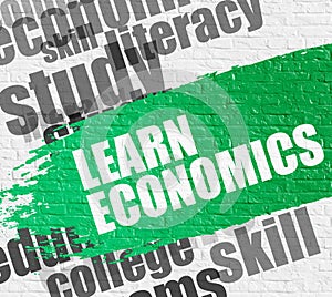 Learn Economics on White Brick Wall.