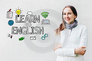 Learn english concept - girl on a white background with text and icons