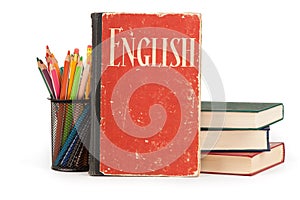 Learn English concept. School supplies and books