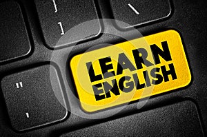 Learn English text button on keyboard, concept background