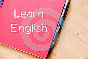 Learn english write on notebook