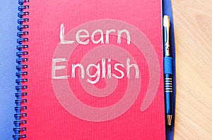 Learn english write on notebook
