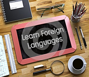 Learn Foreign Languages Concept on Small Chalkboard. 3D.