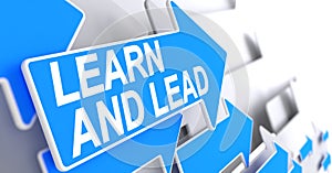 Learn And Lead - Text on Blue Arrow. 3D.
