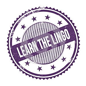 LEARN THE LINGO text written on purple indigo grungy round stamp photo