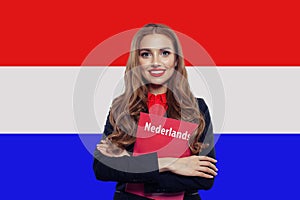 Learn netherlandish language. Happy woman student
