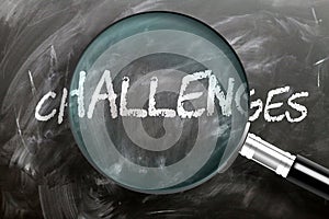 Learn, study and inspect challenges - pictured as a magnifying glass enlarging word challenges, symbolizes researching, exploring